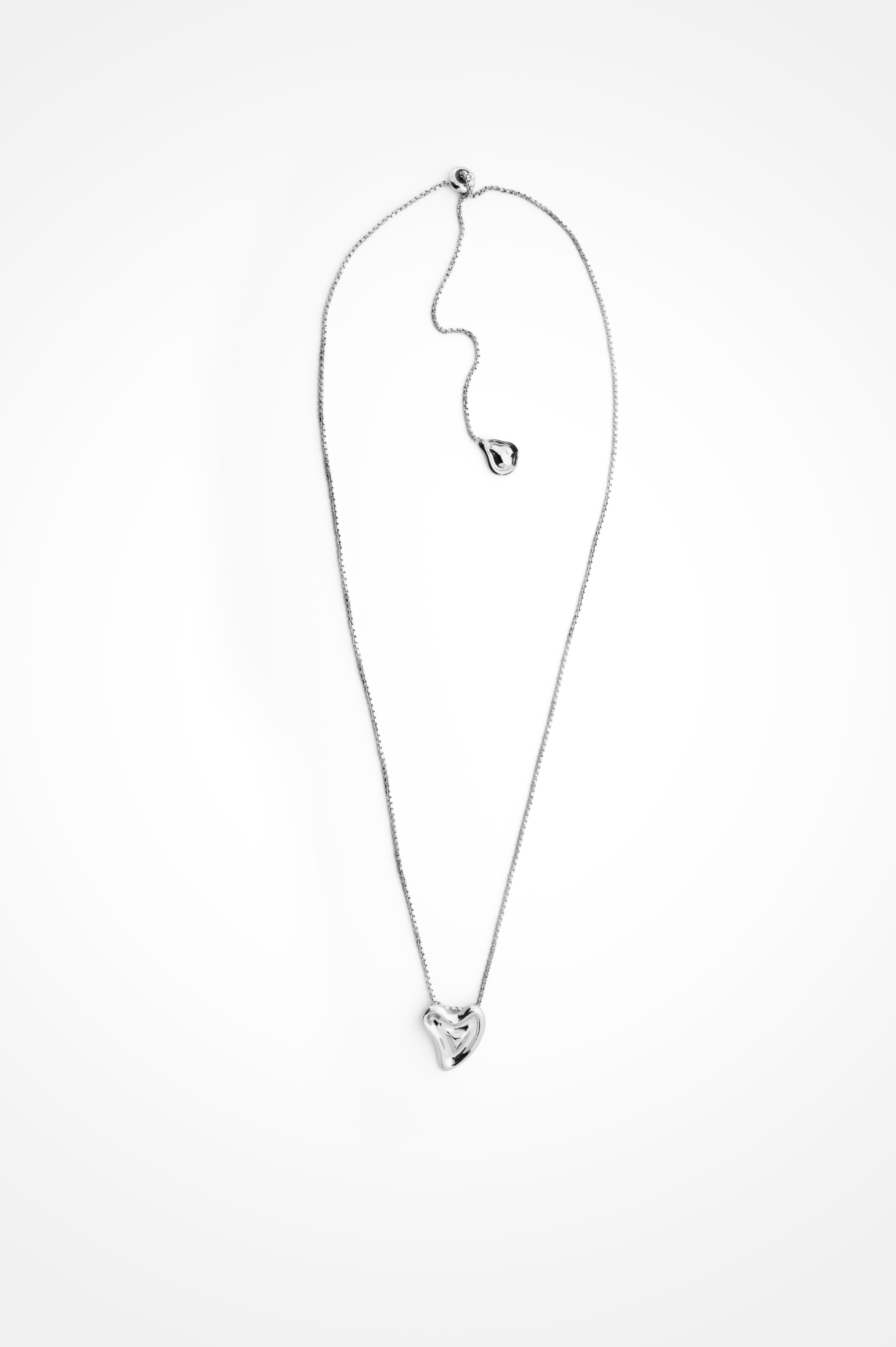 Melted Heart Pendant In Rhodium Plated Brass